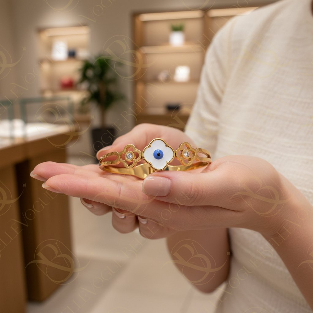 floral gold kada with blue evil eye charm — protective designer kada