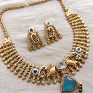 Royal Pachi Kundan Peacock Necklace Set with Statement Teal Gemstone & Antique Gold Finish