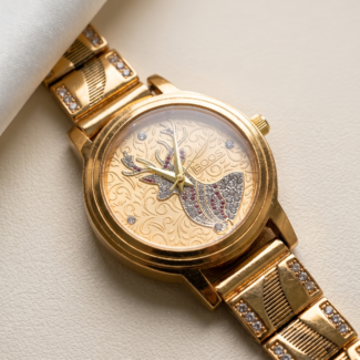 Gold-Tone Stag Motif Ladies Watch with Champagne Dial and CZ Bracelet