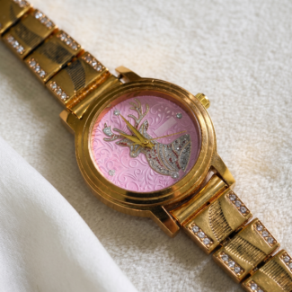 Pink Dial Gold-Tone Ladies Watch with Glitter Stag Motif and CZ Bracelet